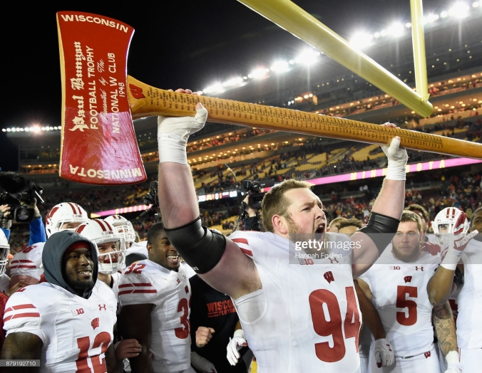Badgers celebrate with Paul Bunyans's Axe